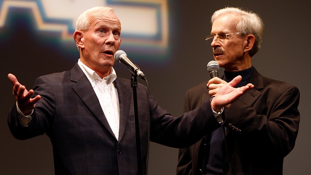 Comedians The Smothers Brothers perform on stage