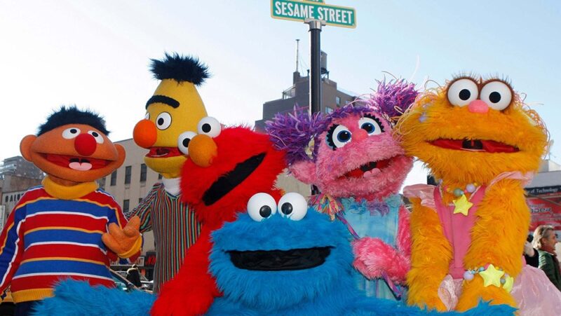Characters from Sesame Street appear on the street by Madison Square Garden in New York.
