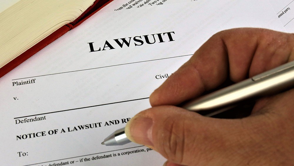 Concept image of a lawsuit being signed