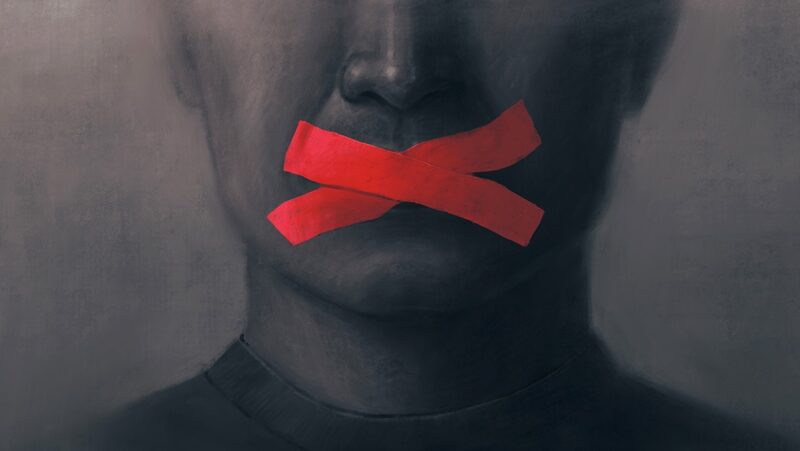 Chilling effect concept. Illustration of face with red tape in X shape over mouth representing censorship.