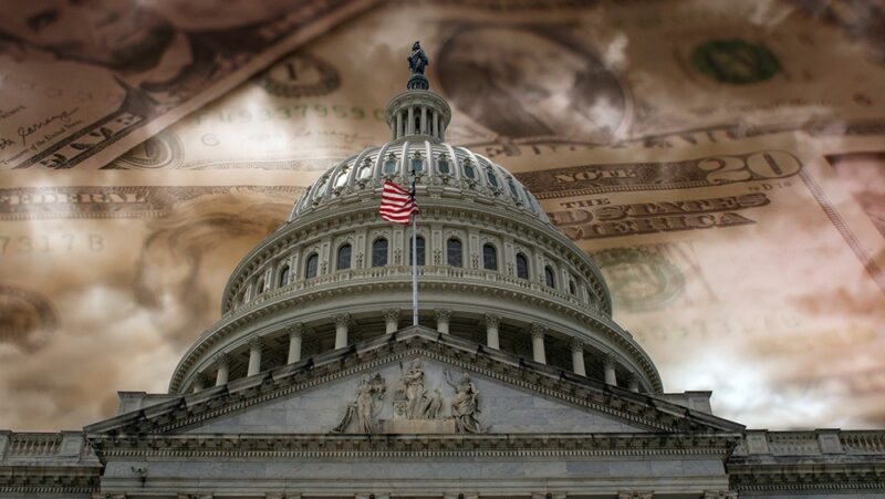 U.S. Capitol building with U.S. currency in background